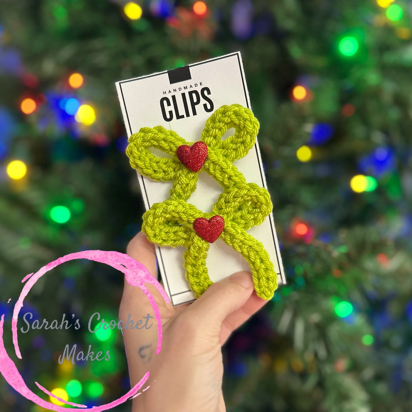 Hand-Tied Green Bows with Red Sparkle Hearts, on CLIPS