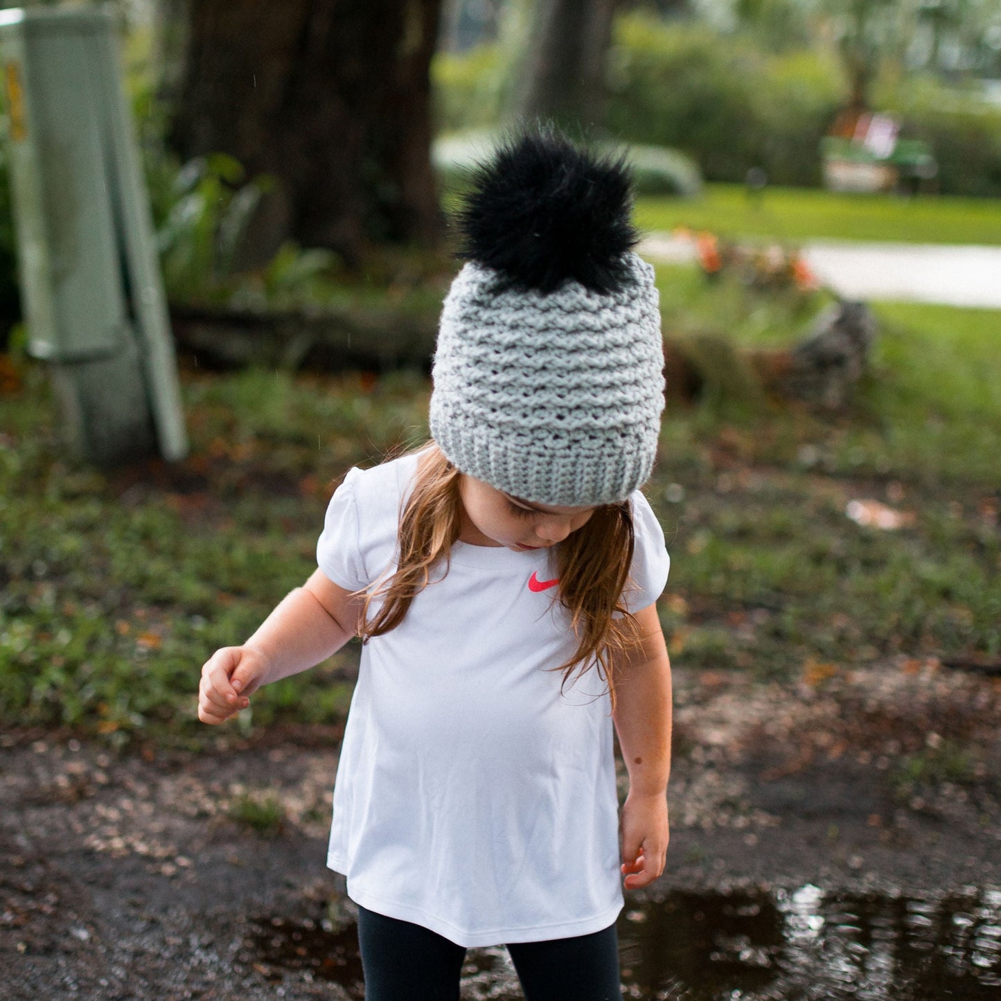 Grey mist beanie with black pom pom