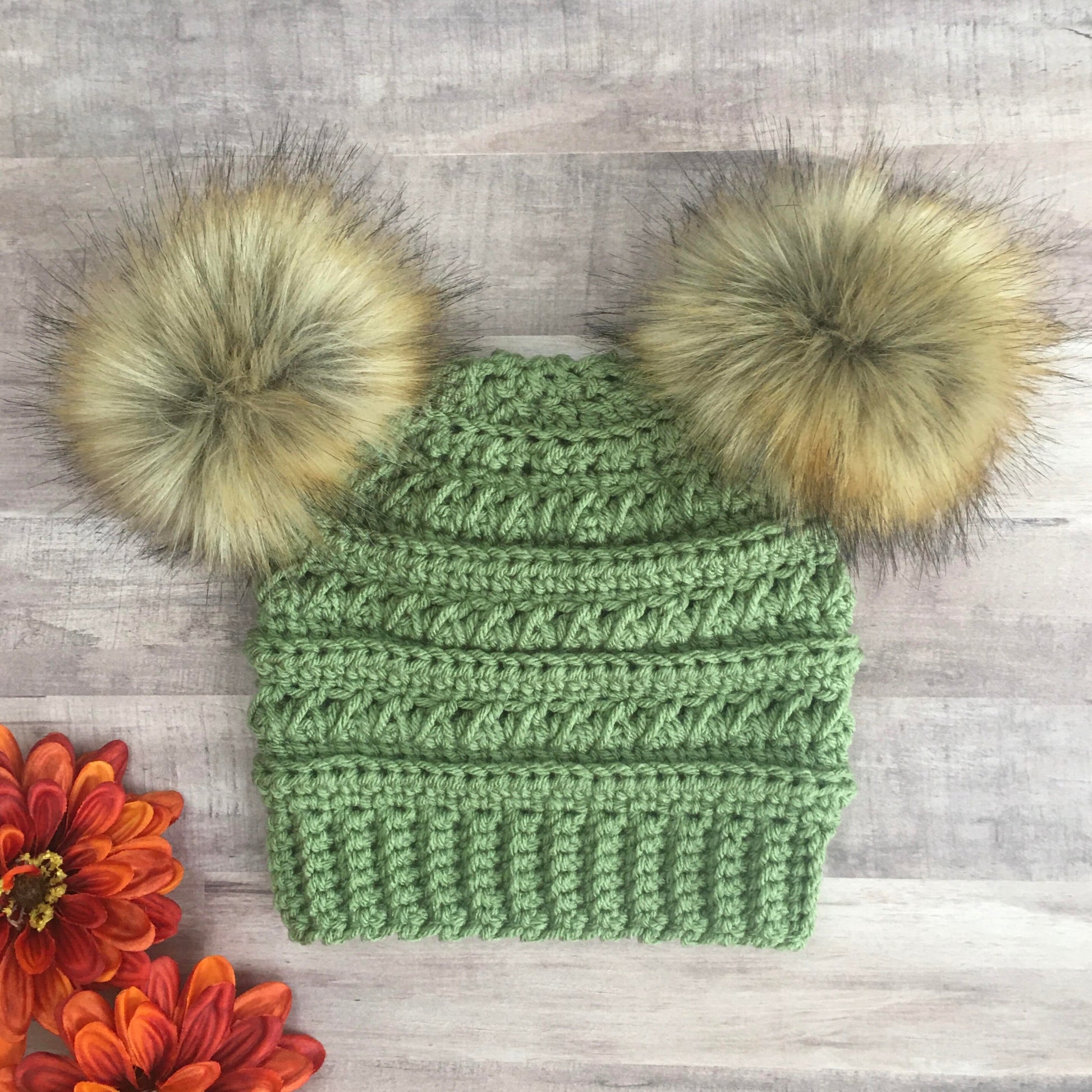 Light sage double pom pom beanie with brown faux fur pom poms