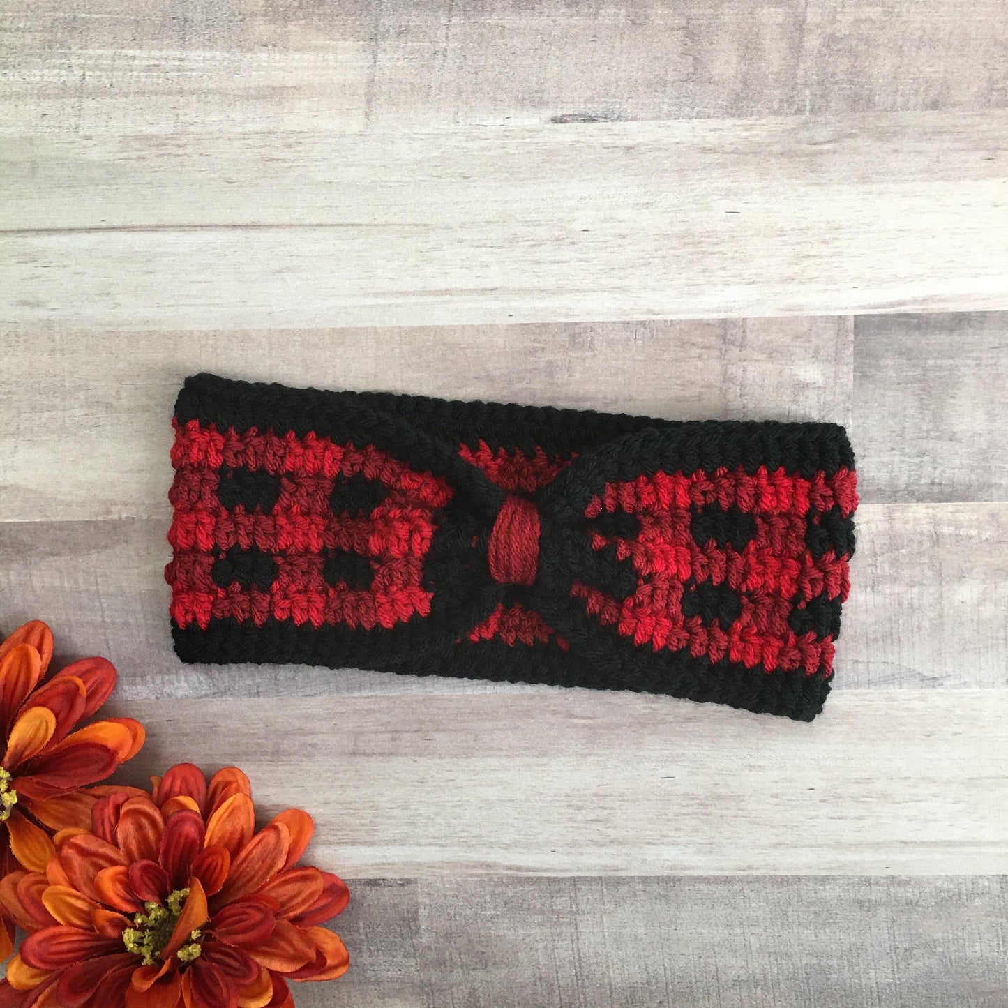 flat lay picture of a buffalo plaid ear warmer headband