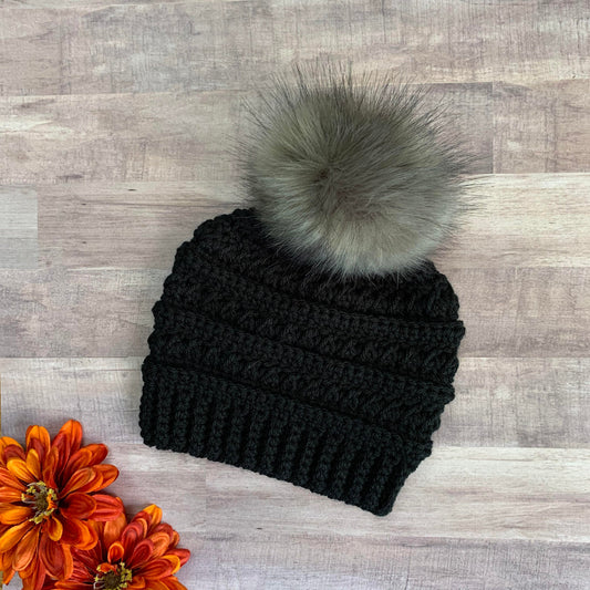 Black beanie with dark grey pom pom