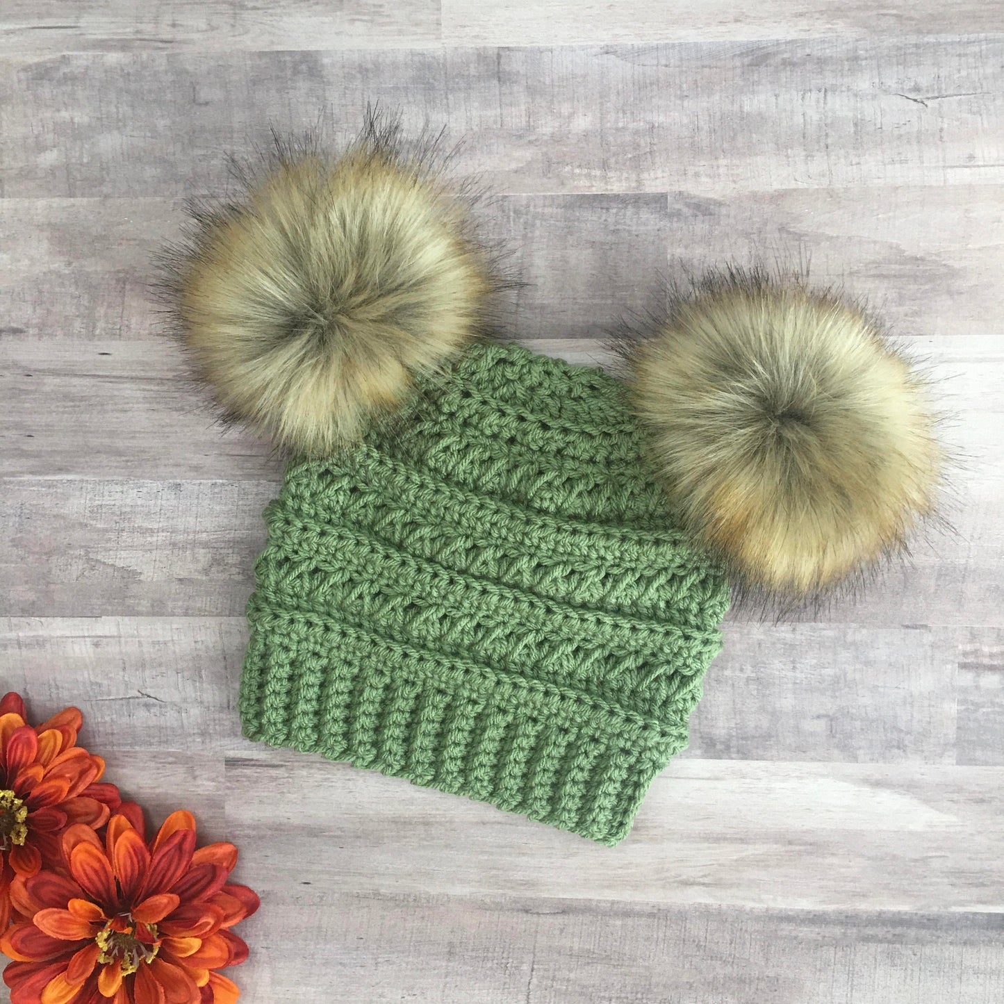 Light sage double pom pom beanie with brown faux fur pom poms