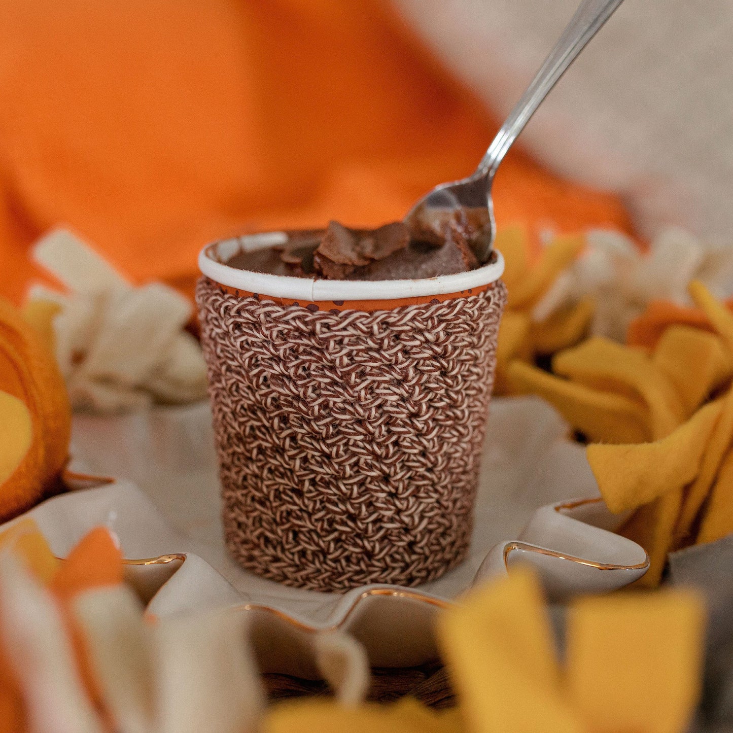 Brown and white pint size ice cream cozy