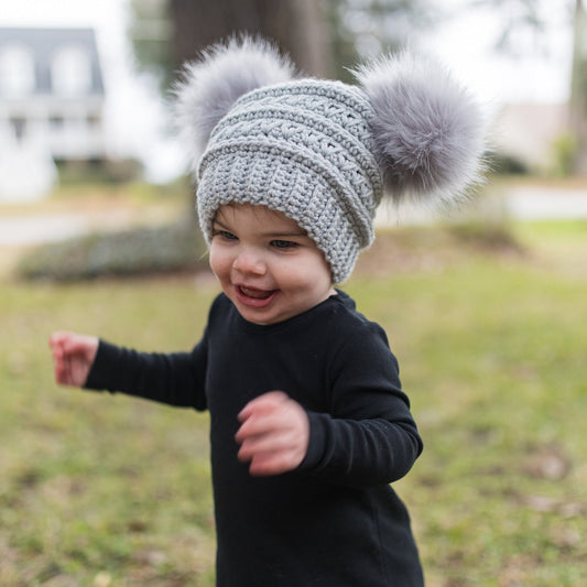 Grey mist beanie with light grey faux fur pom poms