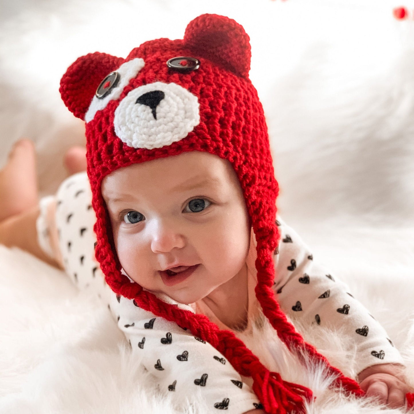 Red bear valentines day beanie on a baby