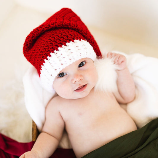 Traditional Christmas Santa hat with a pom pom