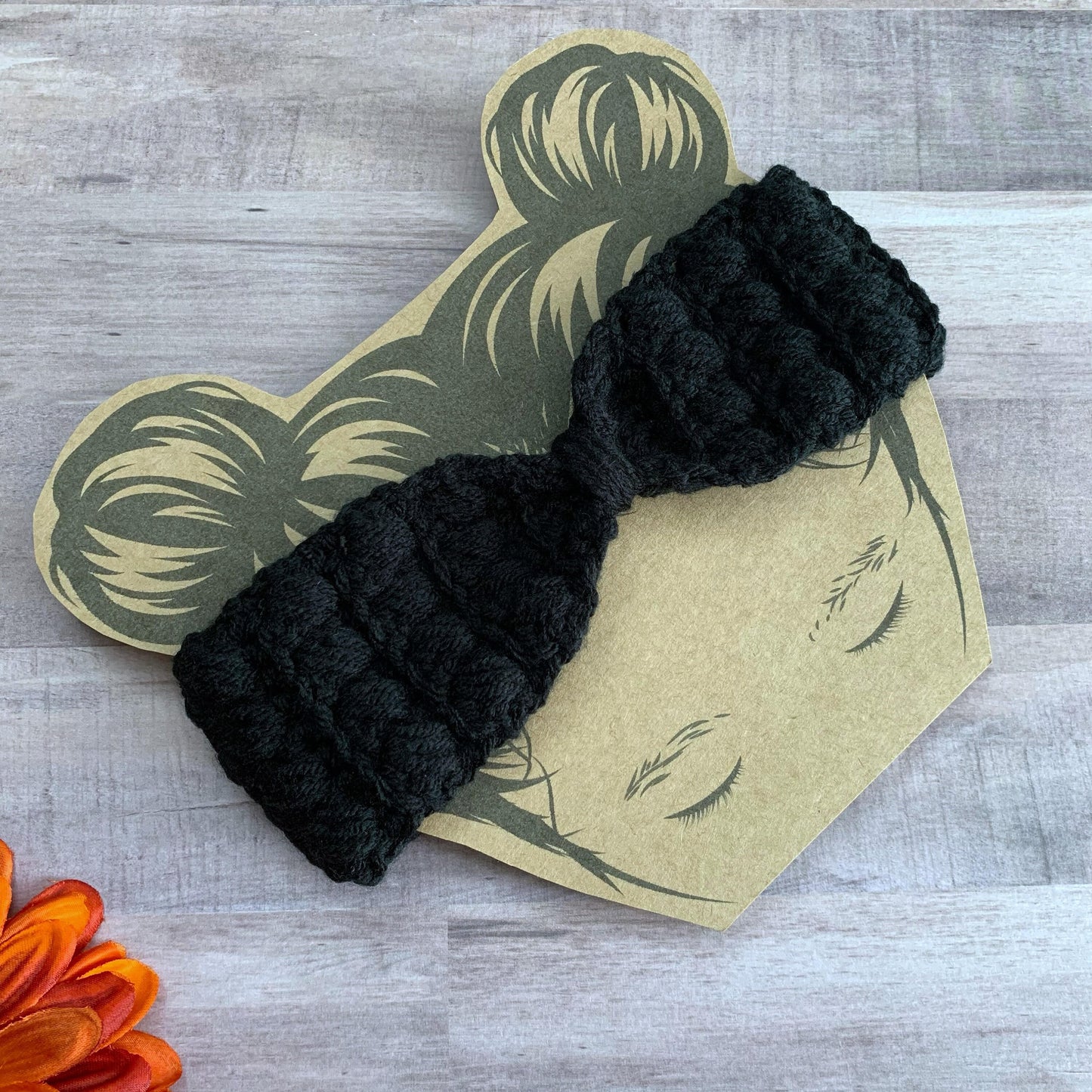 side angle of black ear warmer headband