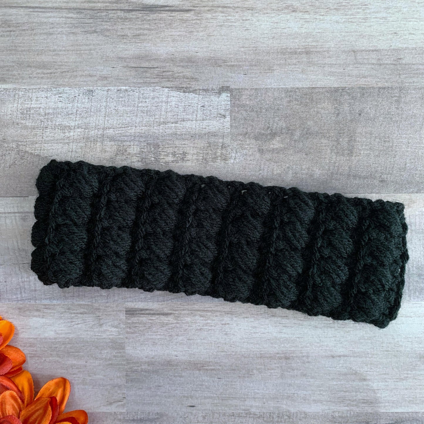 back view of black ear warmer headband